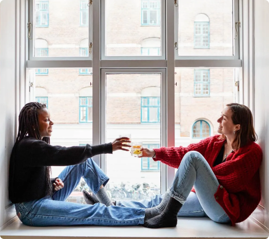 Roommates sharing a drink
